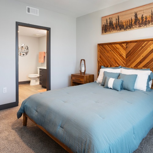 Bedroom with natural lighting and high ceilings