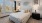Bedroom with natural lighting and high ceilings