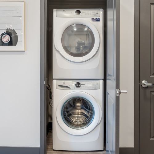 Laundry area and white laundry machines