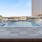 Resort-style swimming pool with lounge seating