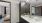 a spacious bathroom with a large mirror